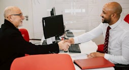 Property Franchisee shaking hands with a client
