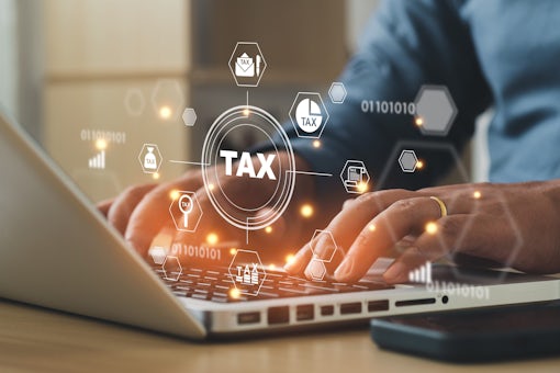digital tax concept- hands using a laptop
