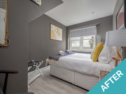 grey themed bedroom with double bed and window st andrews holiday home