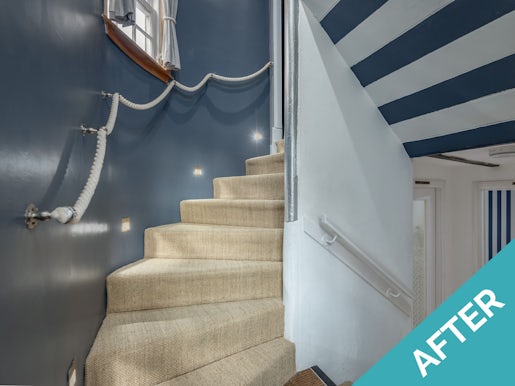 curved staircase with blue and beige theme in st andrews holiday home and student home improvements featured image