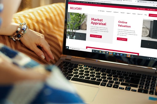 Woman checking the sale offers on the Belvoir website.