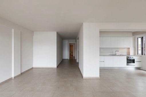 Modern kitchen in empty apartment
