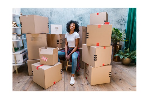Woman packing to move in a new house