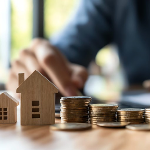 Real estate investor calculating rental income returns, property investment strategy, financial growth, wealth building, copy space.