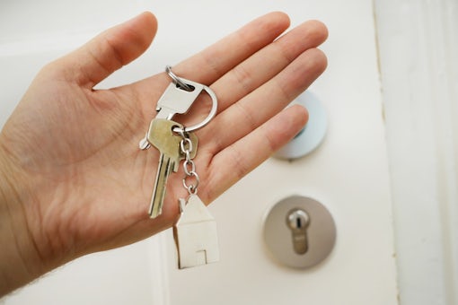 someone holding house keys