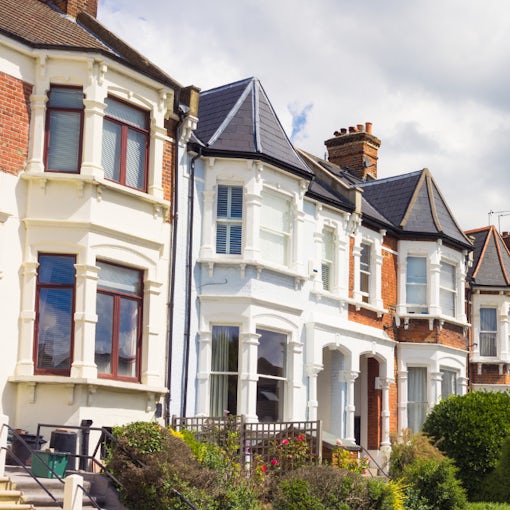 A row of well-maintained terraced houses on a sunny day, symbolising compliant and energy-efficient rental properties in Sleaford for Belvoir’s 2025 landlord guide.