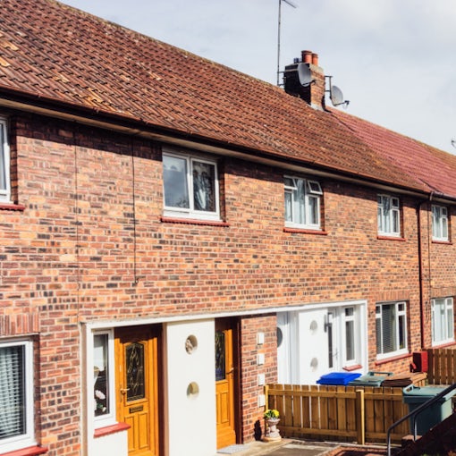 Row of UK terraced houses on a residential street, representing the property market in 2026.