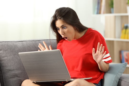 Surprised woman, looking at online offers