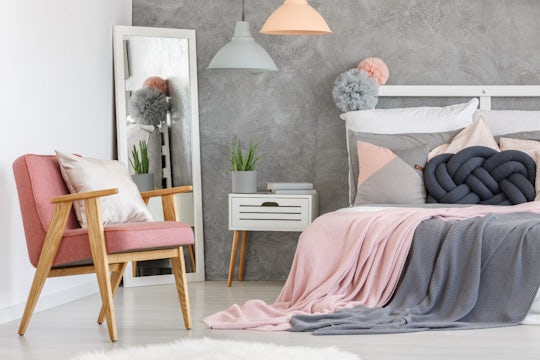 Bedroom interior design in pink and gray colors.