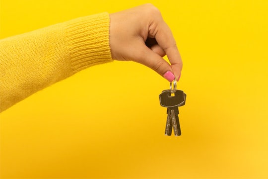 Woman hand holding keys